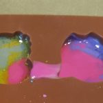 Silicone mold with spilled crayon wax